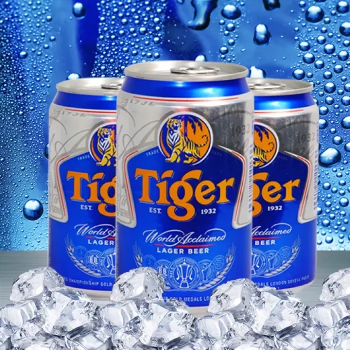 Logo bia Tiger màu cam nổi bật trên nền xanh dương và màu bạc
